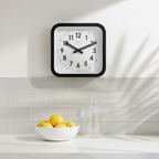 Big Railway Black Square Kitchen Wall Clock with minimalist Dutch design in a modern kitchen setting, functional design.