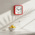 Big Railway Red Square Kitchen Wall Clock with Dutch Design and Functional Design in a bright, minimalist kitchen setting