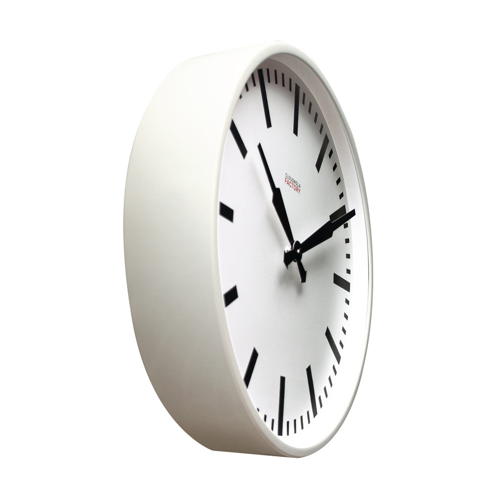 Factory White XL Clock with minimalist black markers and hands in Dutch design emphasizing functional design style