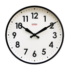 Factory Black XL Clock with bold black numbers and hands on a white face, showcasing Dutch Design and Functional Design principles