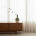 Flip Reversible Ceramic Vase – Ivory & Olive Medium on wooden sideboard with minimalist branch, Dutch Design, Functional Design