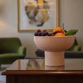 Tip Top Small Ceramic Bowl – Nude Small with fruit, showcasing minimalist Dutch Design and Functional Design for modern home decor