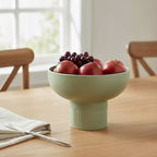 Tip Top Small Ceramic Bowl – Olive Small holding fruit on wooden table in bright kitchen, Dutch Design, Functional Design.