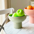 Tip Top Small Ceramic Bowl – Olive Small holding green apples on a marble table in minimalist Dutch design style