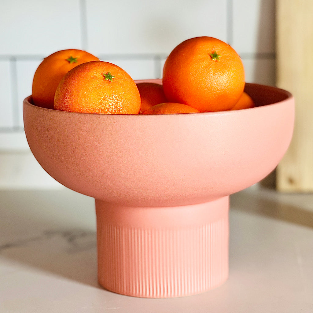 Tip Top XL Ceramic Bowl – Coral XL filled with oranges on a white kitchen counter, Dutch Design, Functional Design