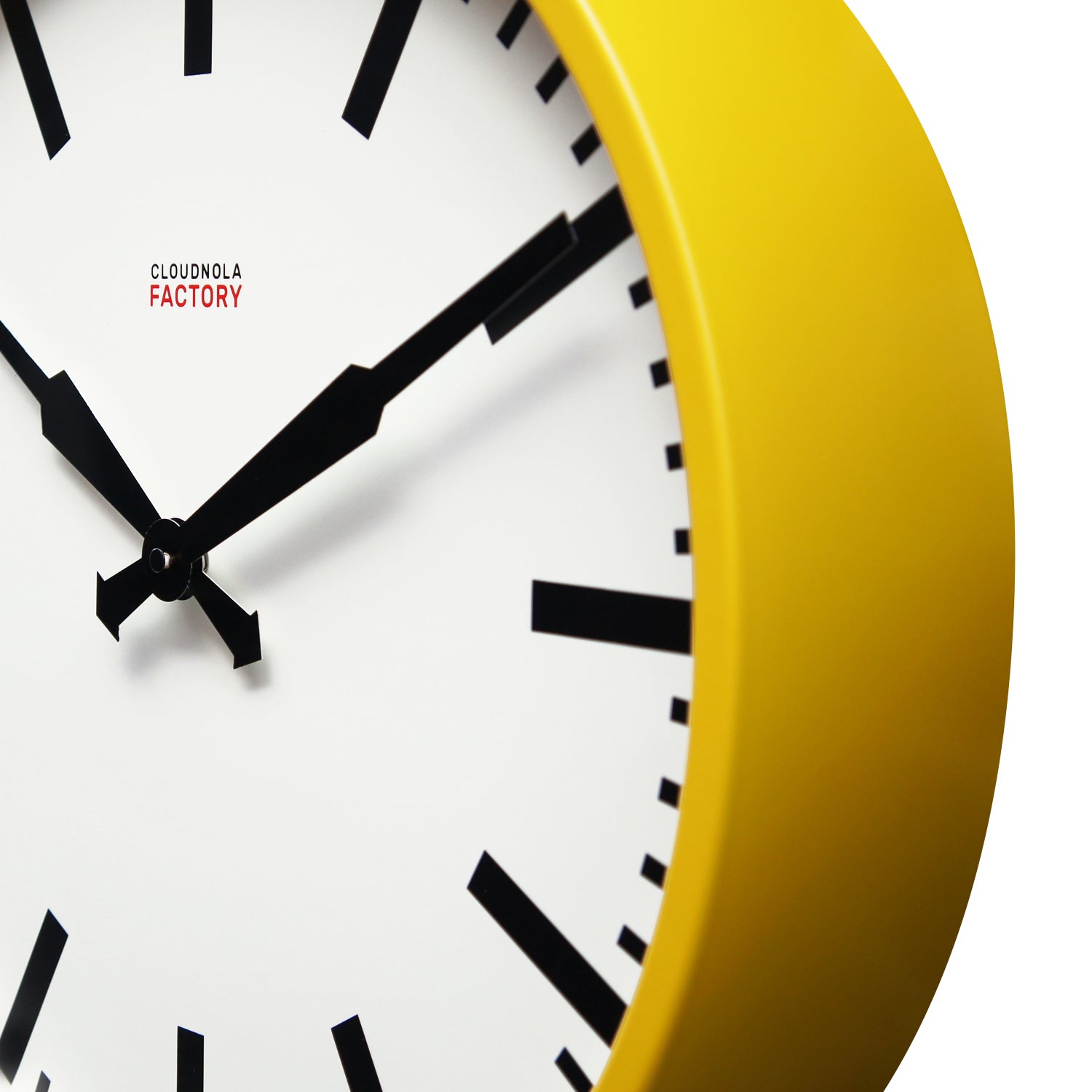 Factory Yellow XL Clock with bold black hands and markers, showcasing Dutch Design and functional design in a modern wall clock.