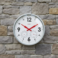 Factory Zinc Outdoor Clock with Dutch Design, red hands, thermometer, and hygrometer on stone wall, functional design.