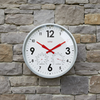 Factory Zinc Outdoor Clock with Dutch Design, red hands, thermometer, and hygrometer on stone wall, functional design.