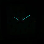 Big Railway Red Square Kitchen Wall Clock with glowing hands showcasing Dutch Design functional design in a dark setting