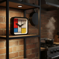 Mondrian Square Kitchen Wall Clock with bold primary colors and black grid, showcasing Dutch Design and Functional Design style.