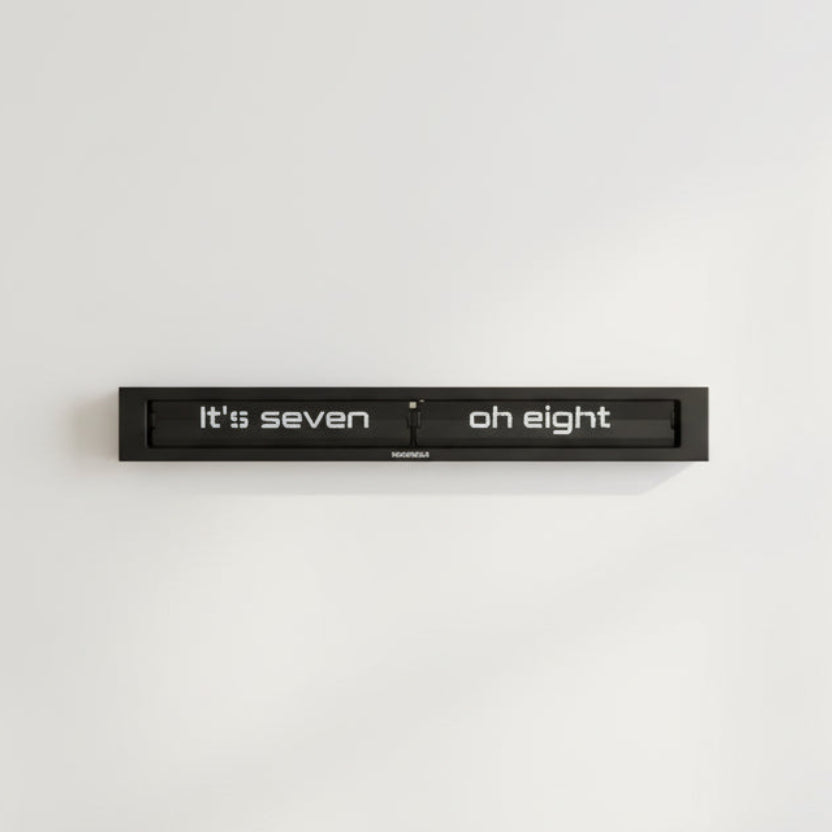 Preorder - Texttime 2.0 BonB Text Flip Clock in black with Dutch Design and Functional Design displaying time in words.