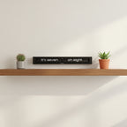 Preorder - Texttime 2.0 BonB Text Flip Clock on shelf between two small potted plants Dutch Design Functional Design